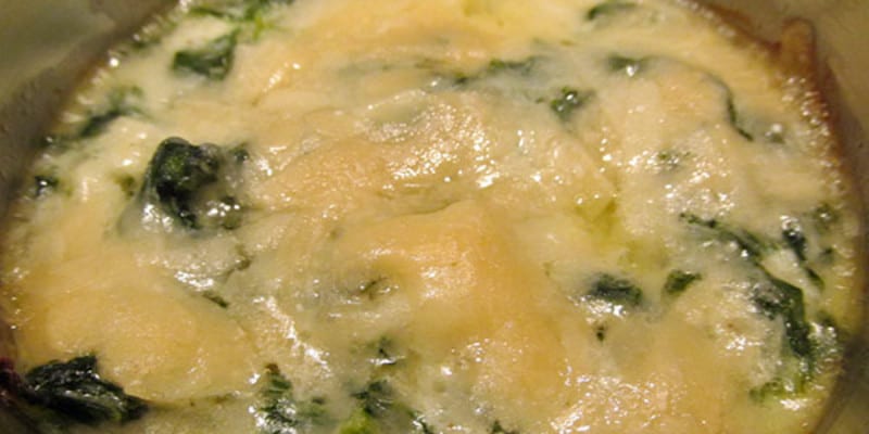 Close up of cheesy kale gratin