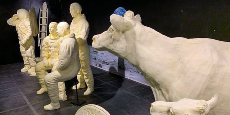 butter sculptures of people and cows